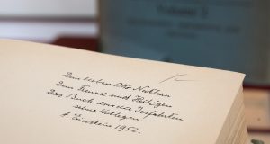 Library Staff Discovers Commitment by Albert Einstein